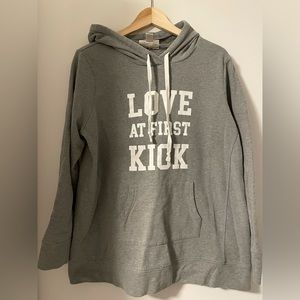 Motherhood maternity hoodie Love at first kick